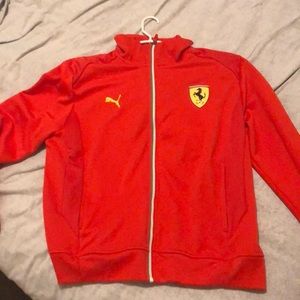 Puma Ferrari orange track jacket.